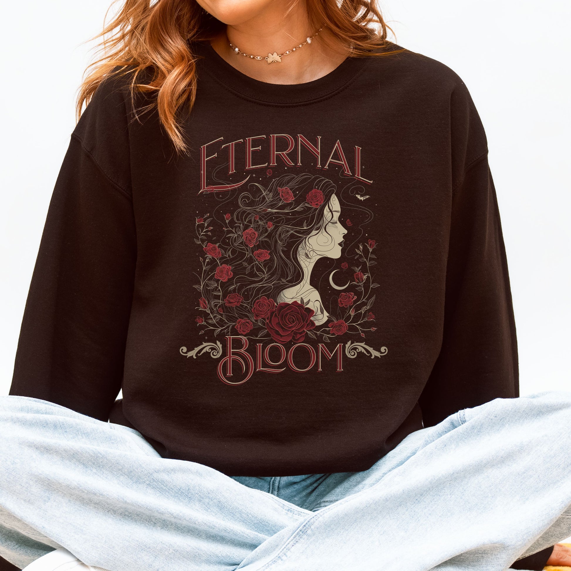 Black crewneck sweatshirt with gothic floral Eternal Bloom artwork