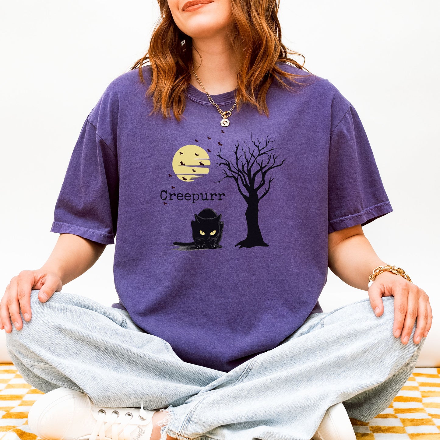 Vintage style spooky cat t-shirt, creepy black cat graphic with moon and flying bats.