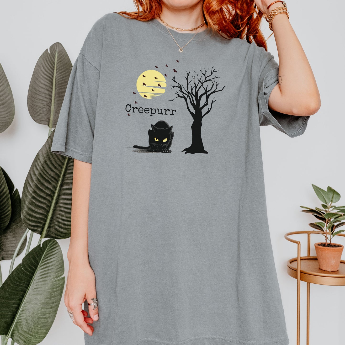 Gothic Halloween top featuring a black cat, retro moon print, and witchy vibes aesthetic.