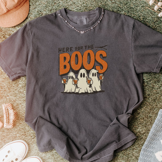 Flat lay mockup of Here for the Boos Halloween shirt, retro ghost design.
