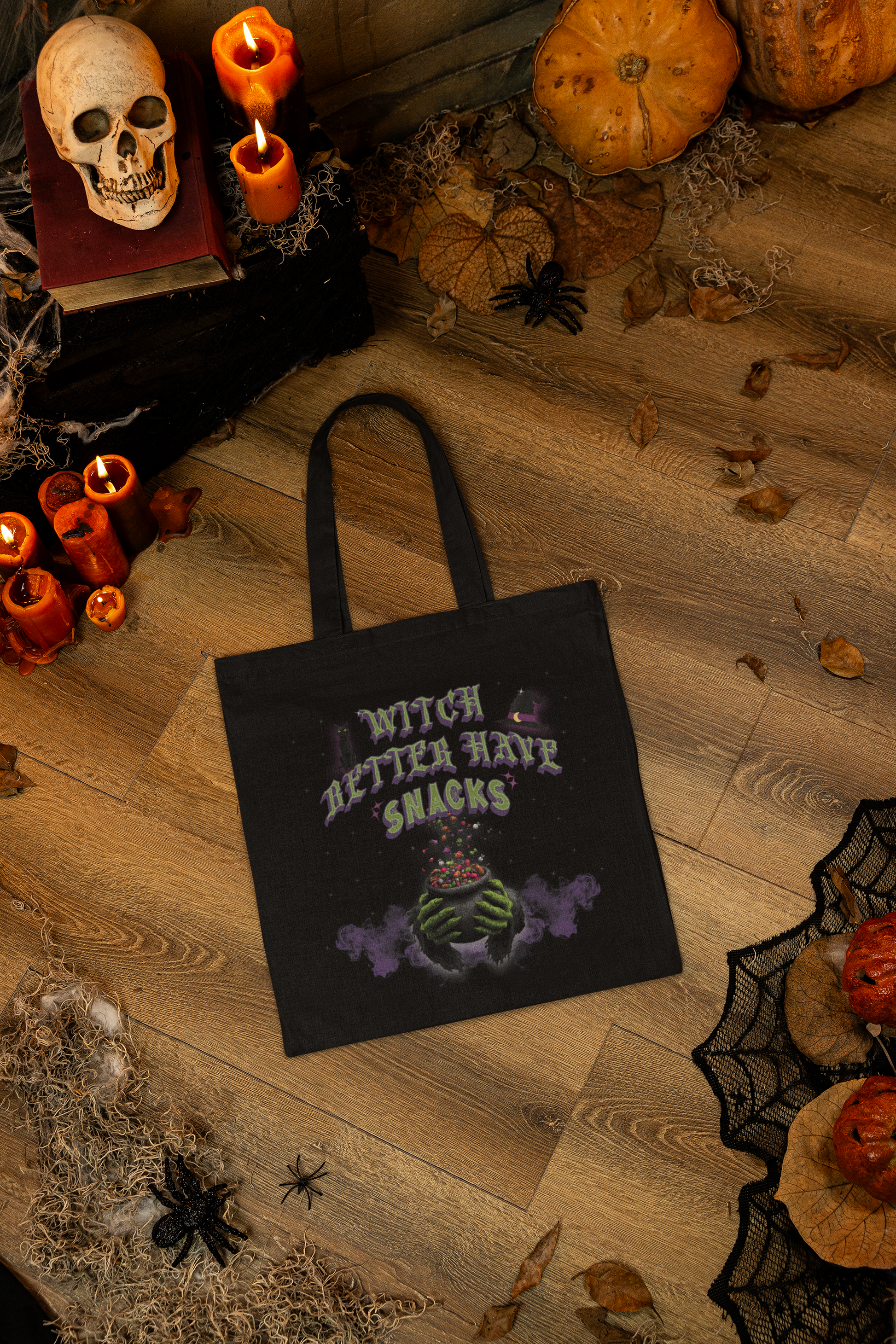 Halloween tote featuring purple smoke and witch cauldron with snacks